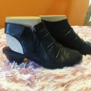 Earth origins black leather boots.